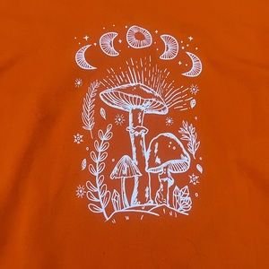 Orange mushroom crewneck size medium